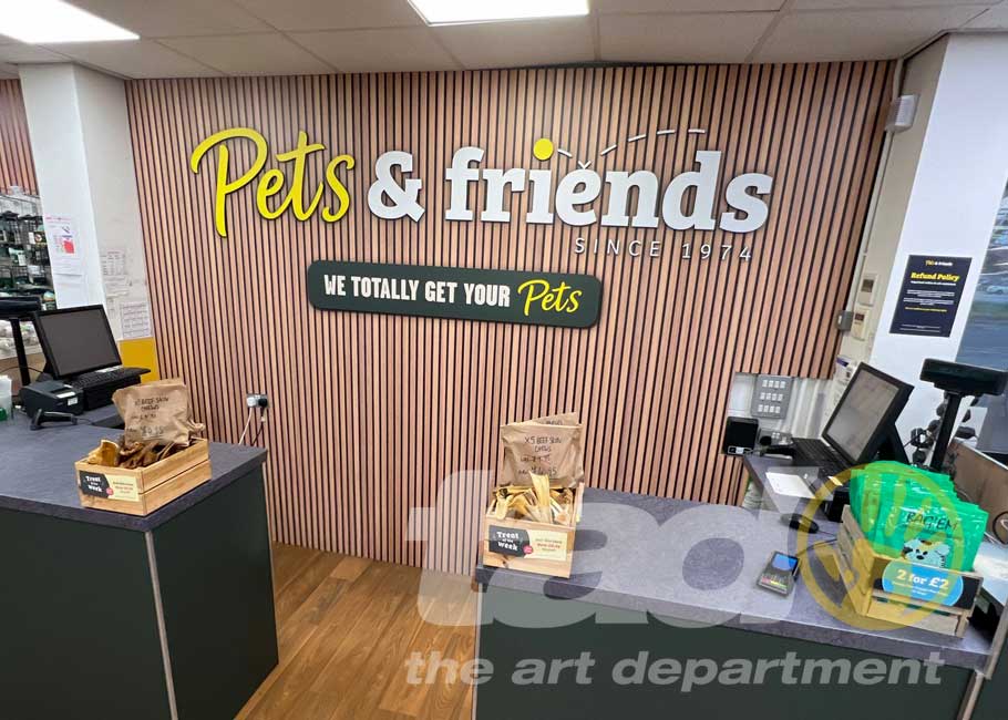 pets & friends behind desk